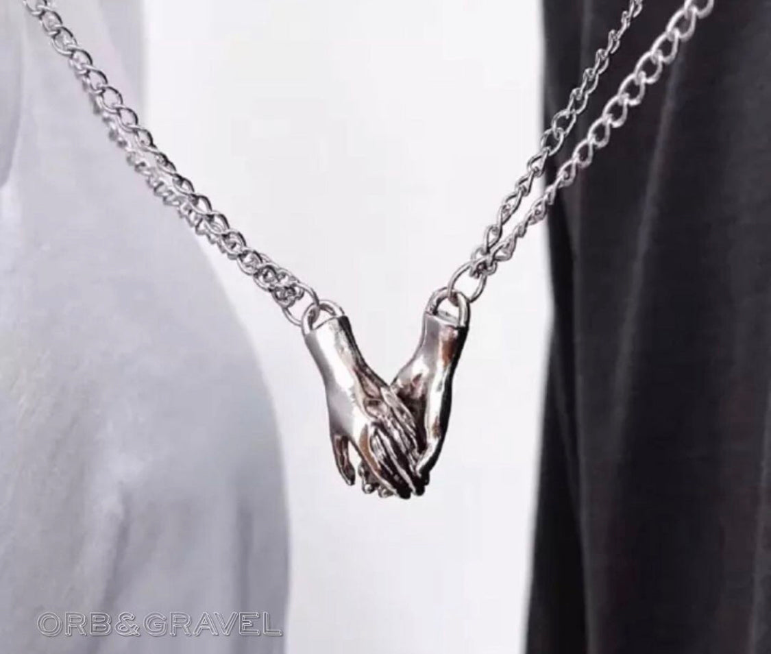 Buy Orb & Gravel Hands Couple Magnet Chain Set in Pakistan